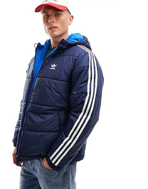 adidas winterjacke herren wendbar dunkelblau|Winterjacke zum Wenden in Dunkelblau mit Kapuze.